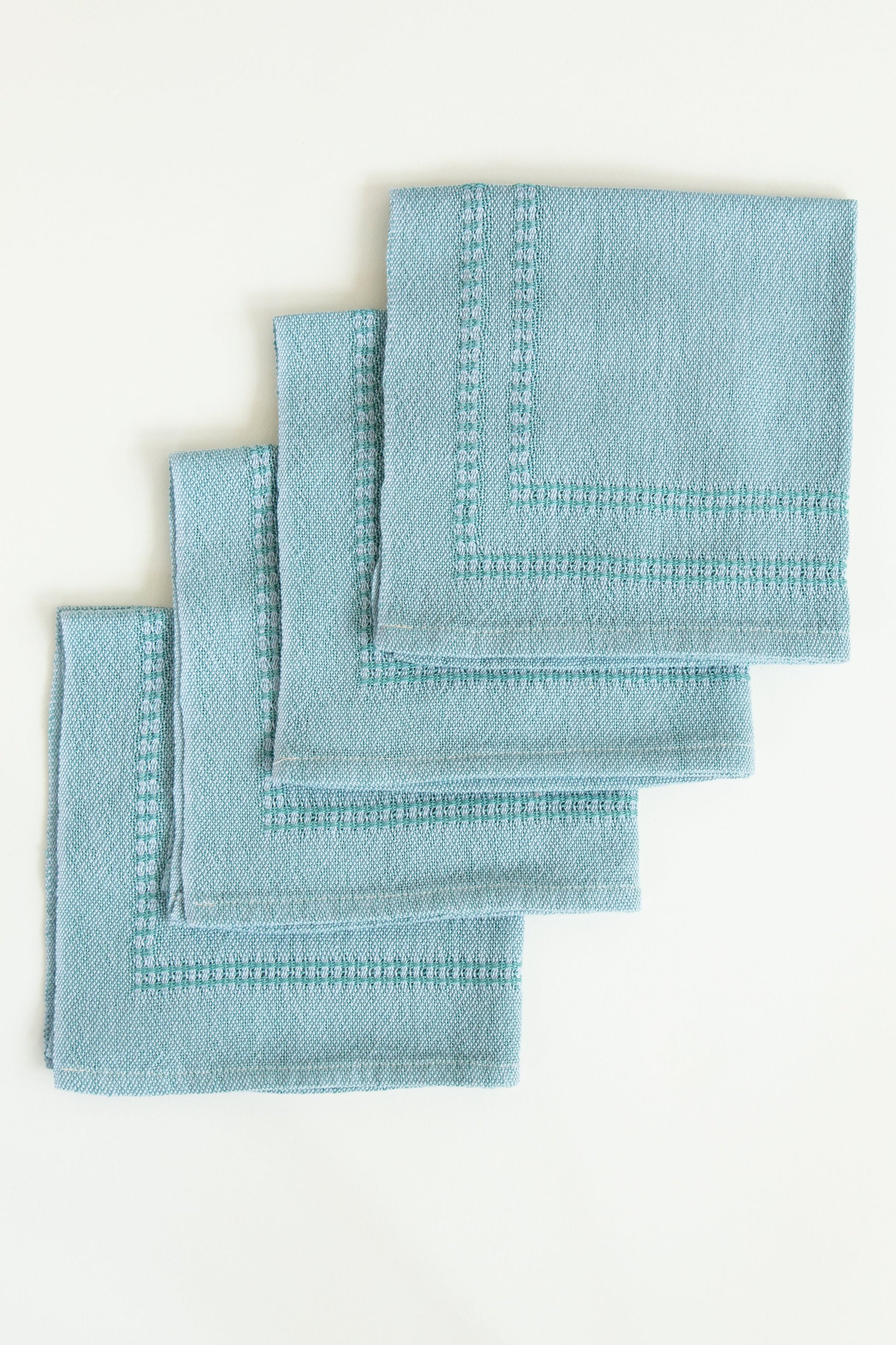 Set of (4) Pale Teal & White Napkins with Bronson Lace